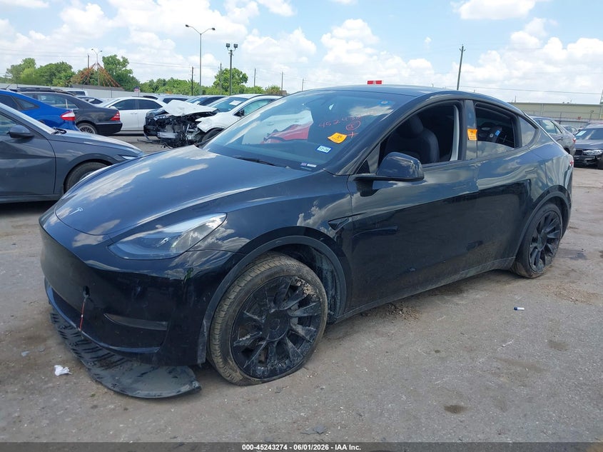 2023 Tesla Model y VIN 7SAYGDEE2PA186100 IAAI salvage auction — FRESH WATER, Salvage Title, sold $7,100 on 2026-07-30 (photo 2)