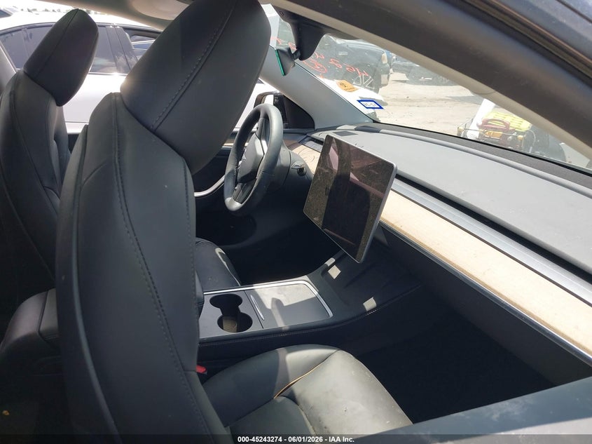 2023 Tesla Model y VIN 7SAYGDEE2PA186100 IAAI salvage auction — FRESH WATER, Salvage Title, sold $7,100 on 2026-07-30 (photo 5)