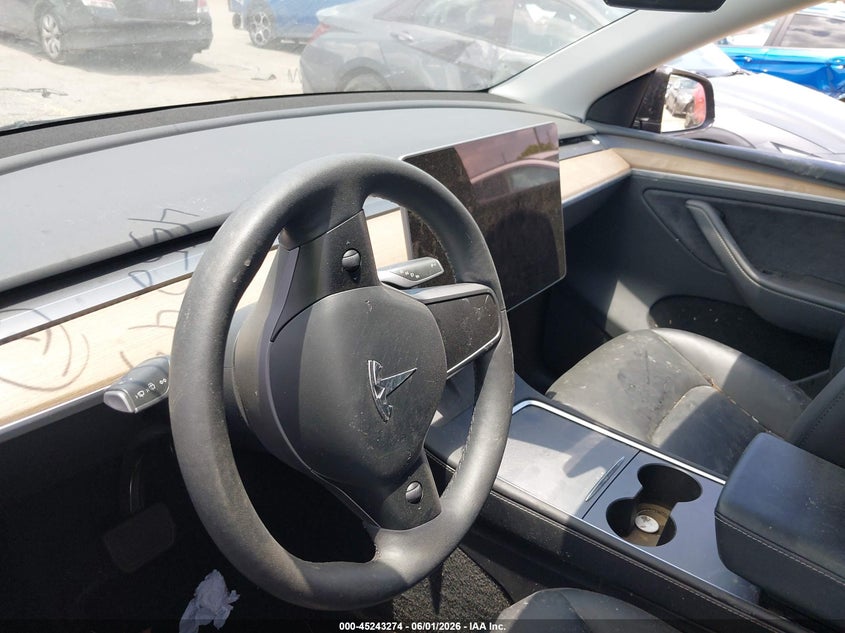 2023 Tesla Model y VIN 7SAYGDEE2PA186100 IAAI salvage auction — FRESH WATER, Salvage Title, sold $7,100 on 2026-07-30 (photo 7)