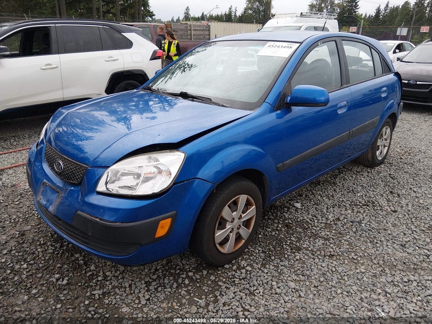 2009 Kia Rio VIN KNADE243596581215 IAAI salvage auction — FRONT & REAR, Bill Of Sale (Washington), sold $250 on 2026-07-08 (photo 2)