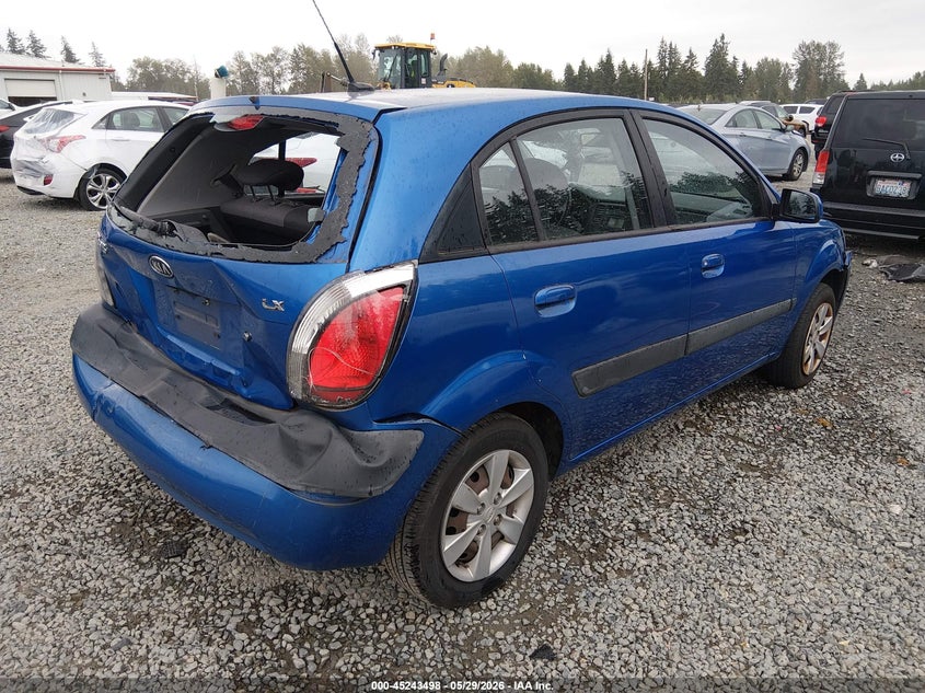 2009 Kia Rio VIN KNADE243596581215 IAAI salvage auction — FRONT & REAR, Bill Of Sale (Washington), sold $250 on 2026-07-08 (photo 4)