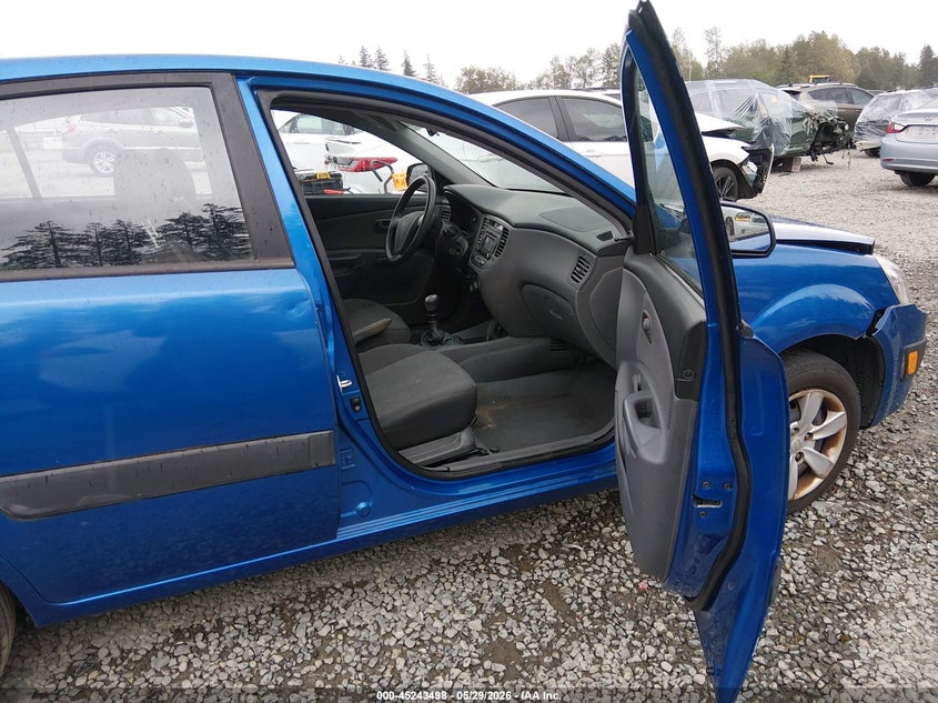 2009 Kia Rio VIN KNADE243596581215 IAAI salvage auction — FRONT & REAR, Bill Of Sale (Washington), sold $250 on 2026-07-08 (photo 5)