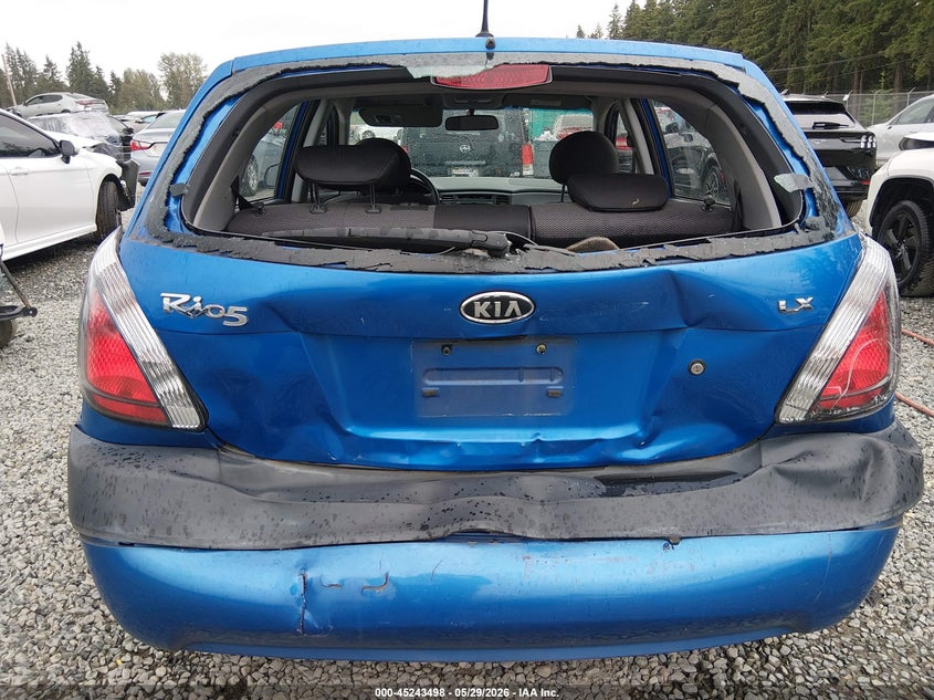 2009 Kia Rio VIN KNADE243596581215 IAAI salvage auction — FRONT & REAR, Bill Of Sale (Washington), sold $250 on 2026-07-08 (photo 6)