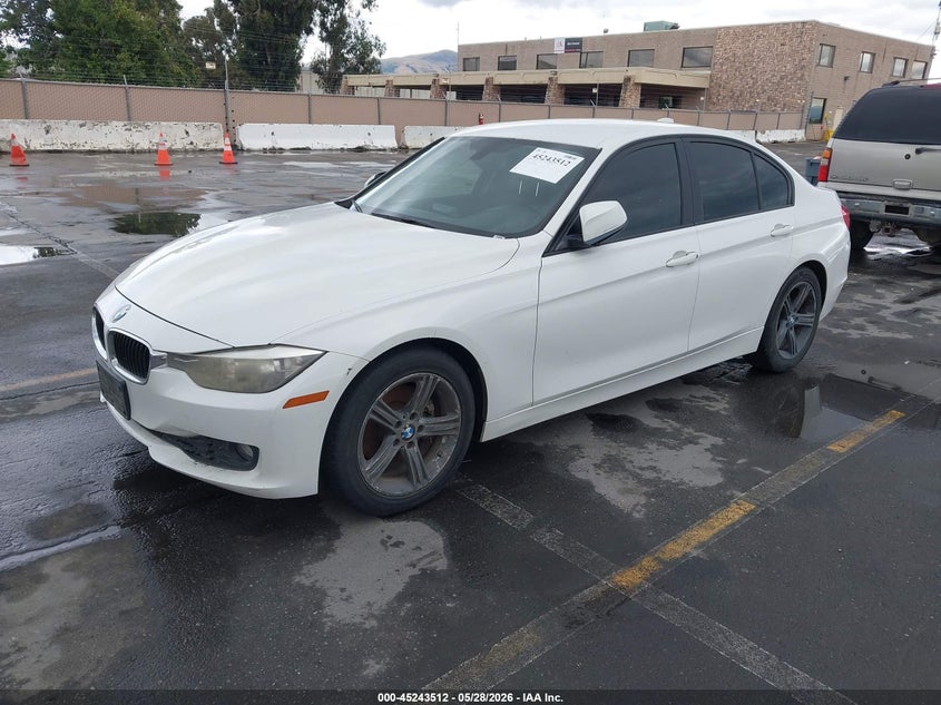 2013 BMW 3er VIN WBA3B1C50DK129383 IAAI salvage auction — NORMAL WEAR, Salvage (California), sold $450 on 2026-07-20 (photo 2)