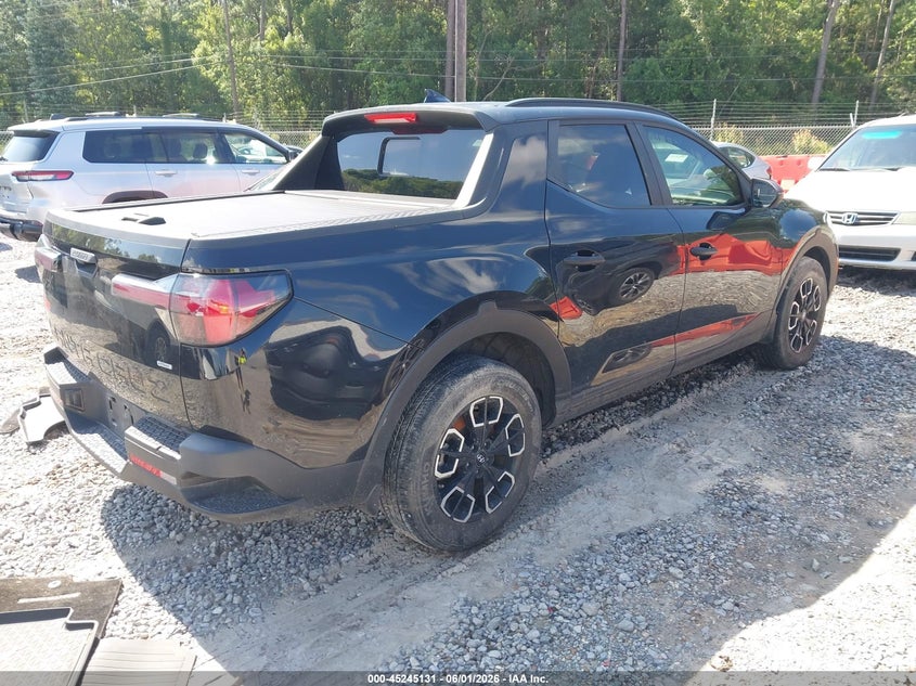 2023 Hyundai Santa cruz VIN 5NTJCDAE6PH063700 IAAI salvage auction — WATER/FLOOD, Salvage Title, sold $10,100 on 2026-07-31 (photo 4)