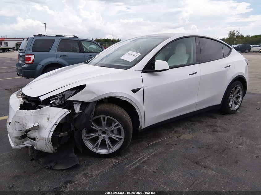 2023 Tesla Model y VIN 7SAYGDEDXPF922789 IAAI salvage auction — LEFT FRONT, Salvage Title, sold $10,100 on 2026-07-23 (photo 2)