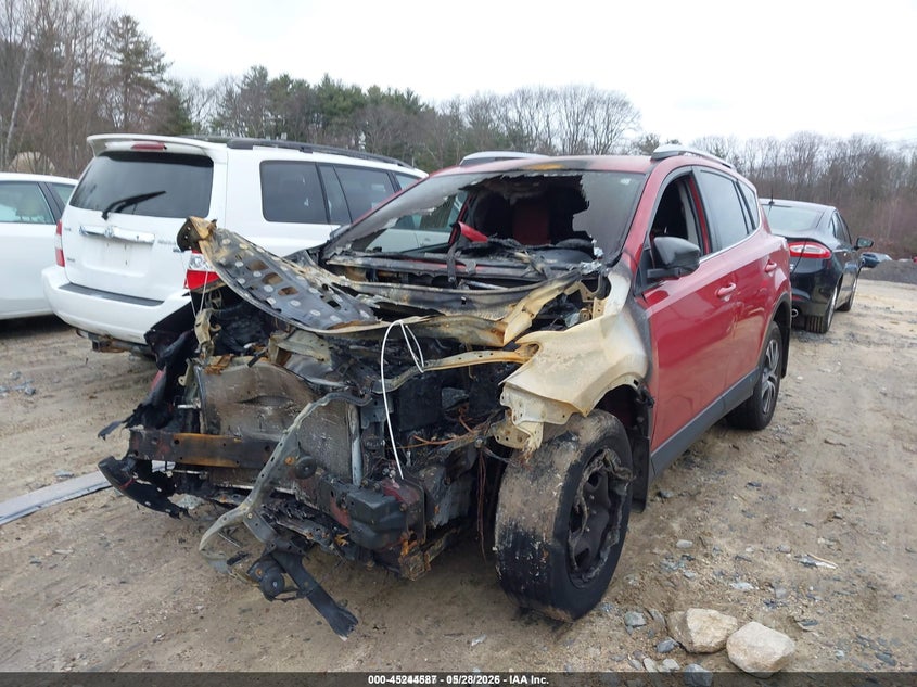 2016 Toyota Rav 4 VIN JTMBFREV7GJ101931 IAAI salvage auction — ENGINE BURN, Salvage Title, sold $75 on 2026-07-21 (photo 2)