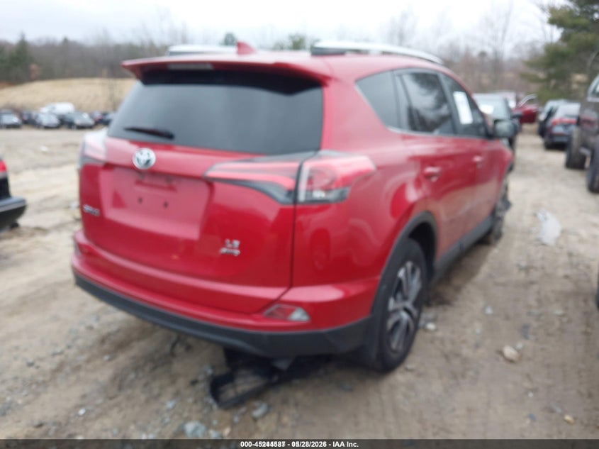 2016 Toyota Rav 4 VIN JTMBFREV7GJ101931 IAAI salvage auction — ENGINE BURN, Salvage Title, sold $75 on 2026-07-21 (photo 4)