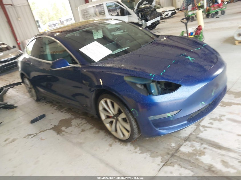 2018 Tesla Model 3 VIN 5YJ3E1EB2JF148426 IAAI salvage auction — UNDERCARRIAGE, Rebuildable (Florida), sold $2,200 on 2026-07-30 (photo 1)