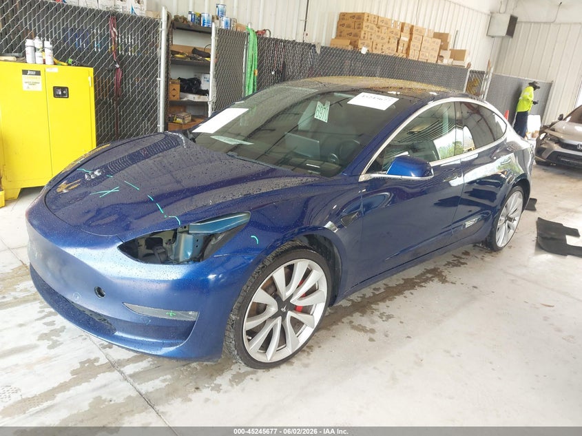 2018 Tesla Model 3 VIN 5YJ3E1EB2JF148426 IAAI salvage auction — UNDERCARRIAGE, Rebuildable (Florida), sold $2,200 on 2026-07-30 (photo 2)