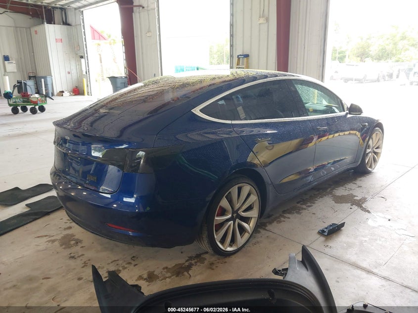 2018 Tesla Model 3 VIN 5YJ3E1EB2JF148426 IAAI salvage auction — UNDERCARRIAGE, Rebuildable (Florida), sold $2,200 on 2026-07-30 (photo 4)