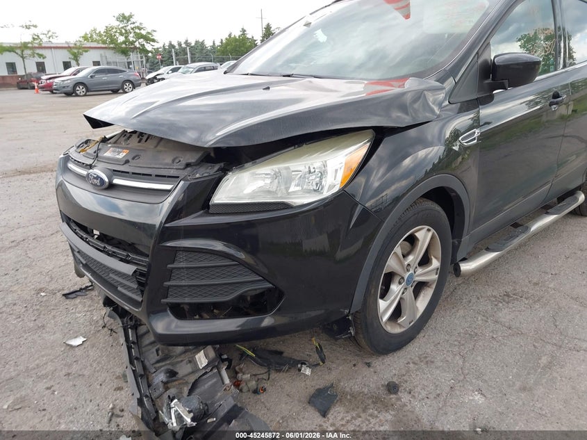 2013 Ford Escape VIN 1FMCU0GX4DUC85428 IAAI salvage auction — RIGHT FRONT, Salvage Title, sold $325 on 2026-07-09 (photo 6)