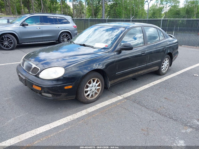 2000 Daewoo Leganza VIN KLAVA6926YB227520 IAAI salvage auction — NORMAL WEAR, Clear (New York), sold $425 on 2026-07-16 (photo 2)