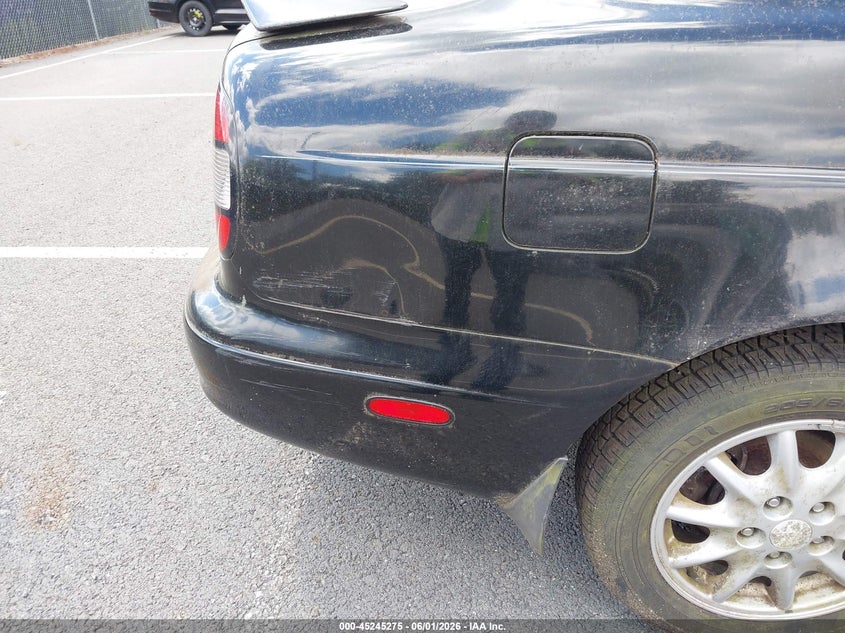 2000 Daewoo Leganza VIN KLAVA6926YB227520 IAAI salvage auction — NORMAL WEAR, Clear (New York), sold $425 on 2026-07-16 (photo 6)