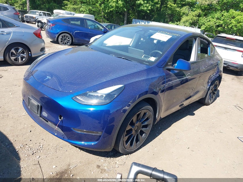 2023 Tesla Model y VIN 7SAYGAEEXPF769063 IAAI salvage auction — LEFT SIDE, Salvage Title, sold $3,350 on 2026-07-23 (photo 2)