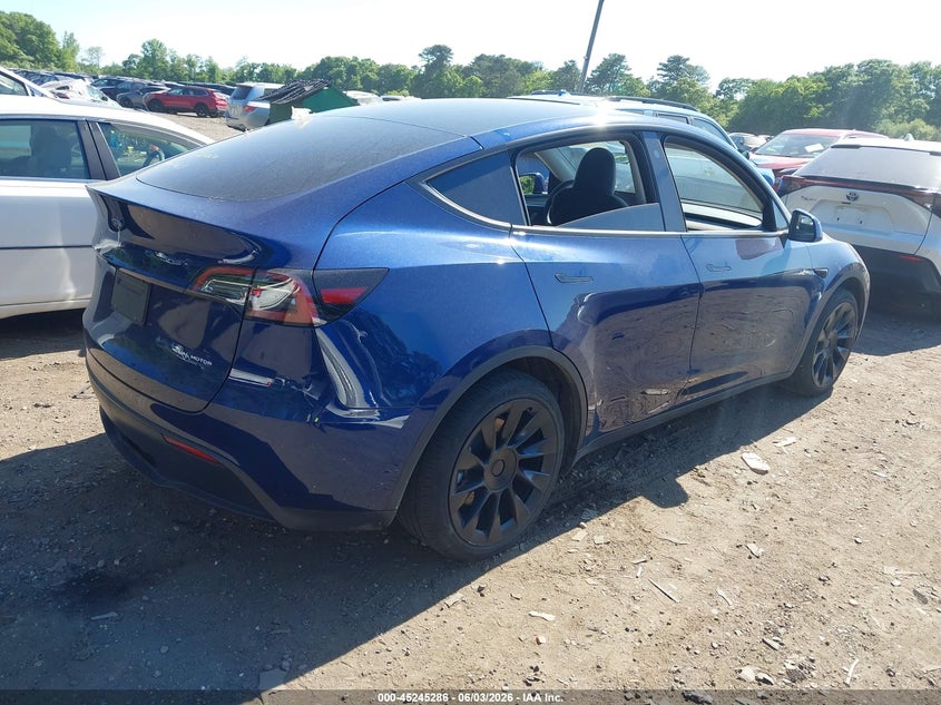 2023 Tesla Model y VIN 7SAYGAEEXPF769063 IAAI salvage auction — LEFT SIDE, Salvage Title, sold $3,350 on 2026-07-23 (photo 4)