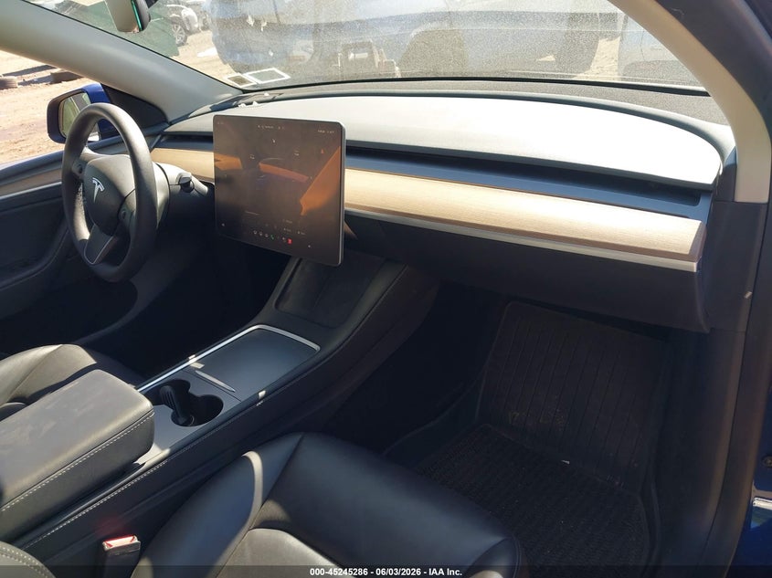 2023 Tesla Model y VIN 7SAYGAEEXPF769063 IAAI salvage auction — LEFT SIDE, Salvage Title, sold $3,350 on 2026-07-23 (photo 5)