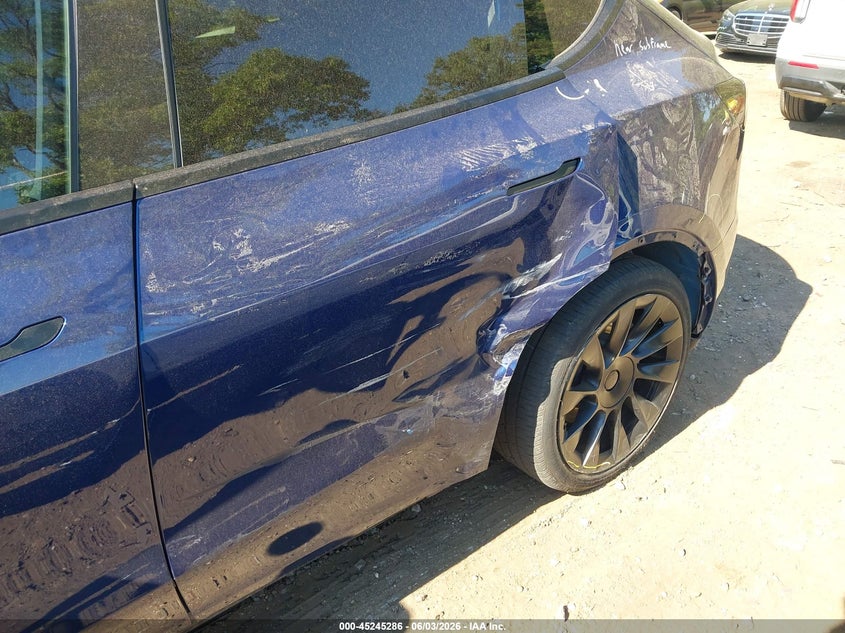 2023 Tesla Model y VIN 7SAYGAEEXPF769063 IAAI salvage auction — LEFT SIDE, Salvage Title, sold $3,350 on 2026-07-23 (photo 6)