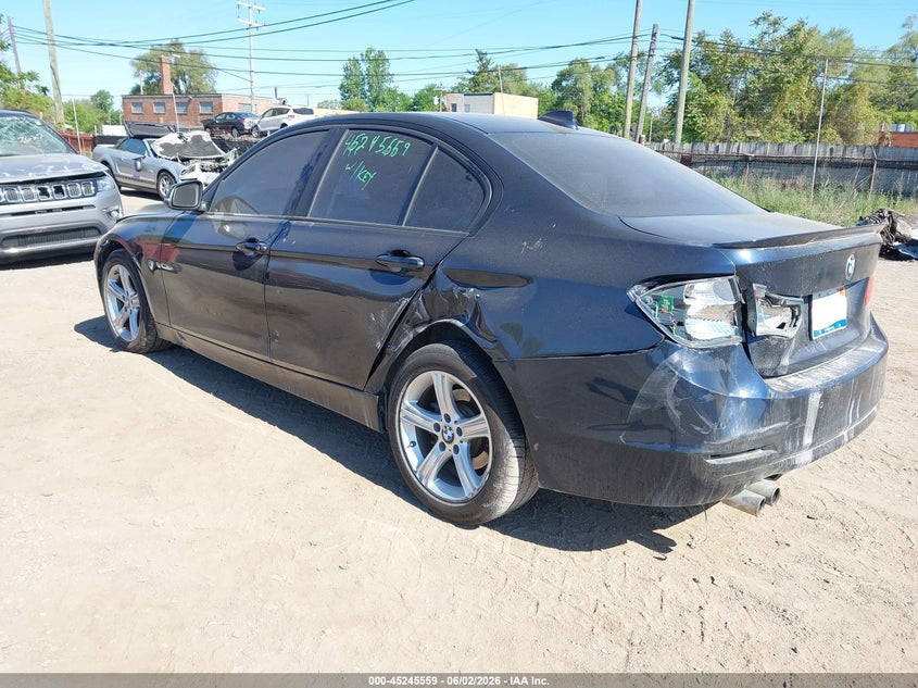 2014 BMW 3er VIN WBA3B3C59EJ980391 IAAI salvage auction — FRONT & REAR, Salvage Title, sold $575 on 2026-07-09 (photo 3)
