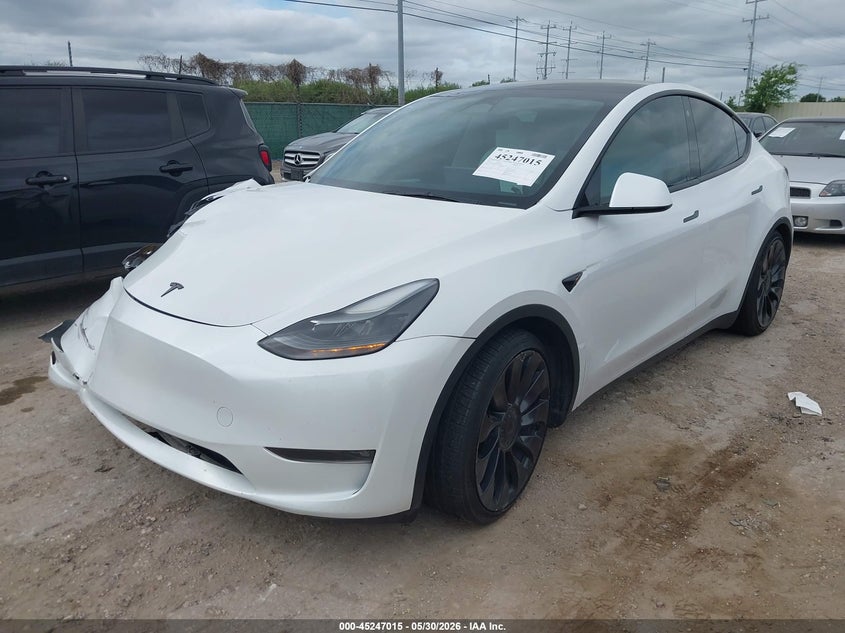 2023 Tesla Model y VIN 7SAYGDEF3PF695026 IAAI salvage auction — RIGHT FRONT, Salvage Title, sold $11,200 on 2026-07-16 (photo 2)
