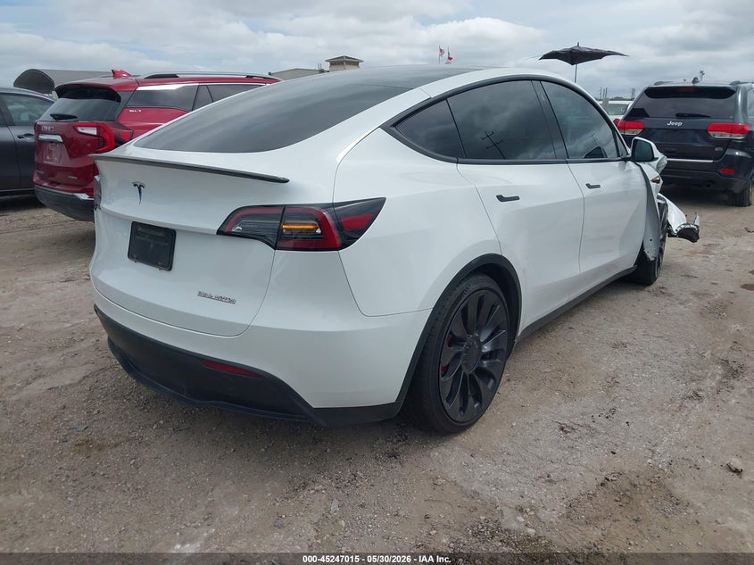 2023 Tesla Model y VIN 7SAYGDEF3PF695026 IAAI salvage auction — RIGHT FRONT, Salvage Title, sold $11,200 on 2026-07-16 (photo 4)