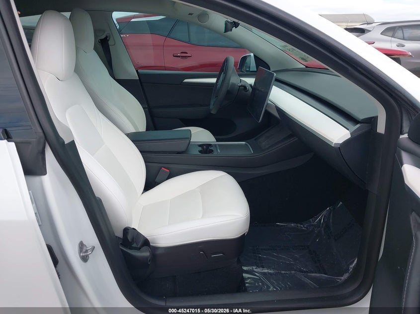 2023 Tesla Model y VIN 7SAYGDEF3PF695026 IAAI salvage auction — RIGHT FRONT, Salvage Title, sold $11,200 on 2026-07-16 (photo 5)