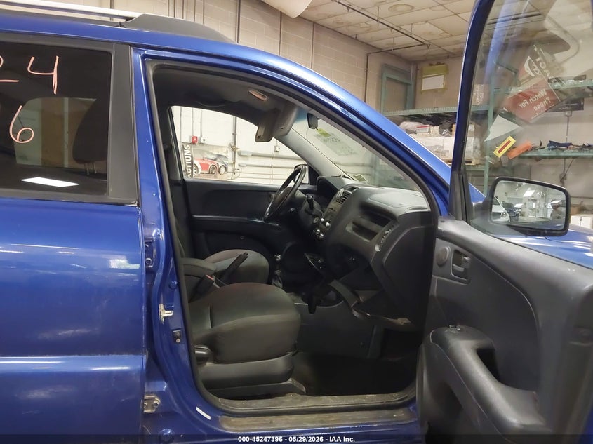 2009 Kia Sportage VIN KNDJF724997574290 IAAI salvage auction — NORMAL WEAR, Original (Maine), sold $875 on 2026-07-06 (photo 5)