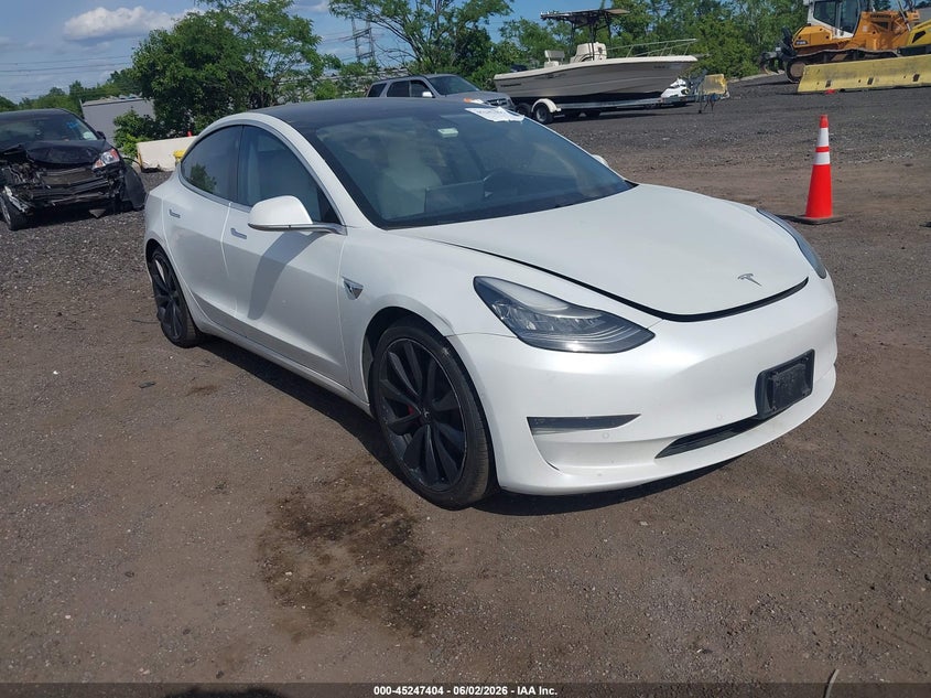 2020 Tesla Model 3 VIN 5YJ3E1EC2LF784243 IAAI salvage auction — LEFT SIDE, Salvage Title, sold $5,450 on 2026-07-09 (photo 1)