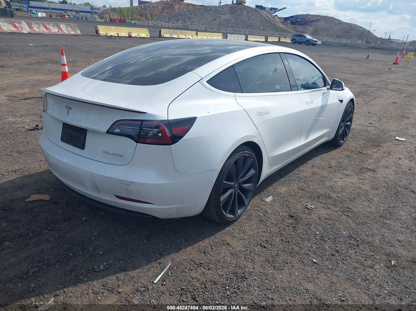 2020 Tesla Model 3 VIN 5YJ3E1EC2LF784243 IAAI salvage auction — LEFT SIDE, Salvage Title, sold $5,450 on 2026-07-09 (photo 4)