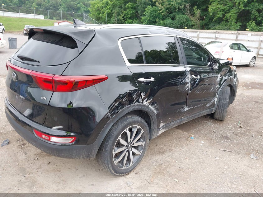 2019 Kia Sportage VIN KNDPNCAC2K7604007 IAAI salvage auction — ROLLOVER, Salvage Title, sold $1,000 on 2026-07-22 (photo 4)