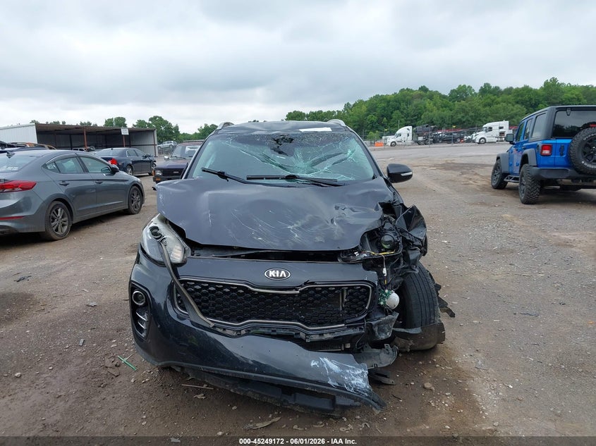2019 Kia Sportage VIN KNDPNCAC2K7604007 IAAI salvage auction — ROLLOVER, Salvage Title, sold $1,000 on 2026-07-22 (photo 6)