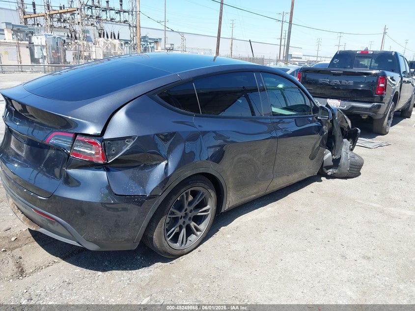 2025 Tesla Model y VIN 7SAYGDED6SF229808 IAAI salvage auction — RIGHT SIDE, Salvage Title, sold $9,350 on 2026-07-23 (photo 4)