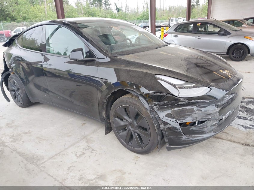 2025 Tesla Model y VIN 7SAYGDEE5SF300358 IAAI salvage auction — FRONT & REAR, Salvage Title, sold $7,900 on 2026-07-16 (photo 1)