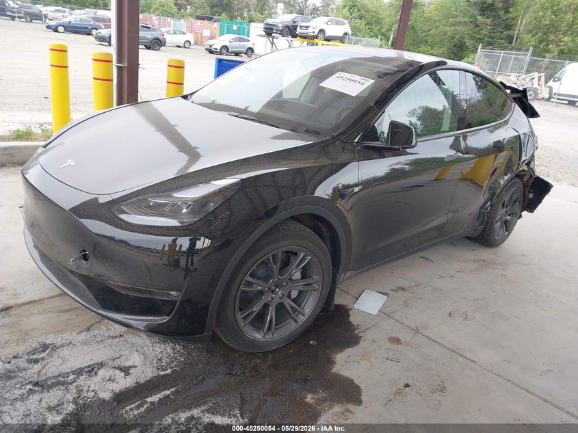 2025 Tesla Model y VIN 7SAYGDEE5SF300358 IAAI salvage auction — FRONT & REAR, Salvage Title, sold $7,900 on 2026-07-16 (photo 2)