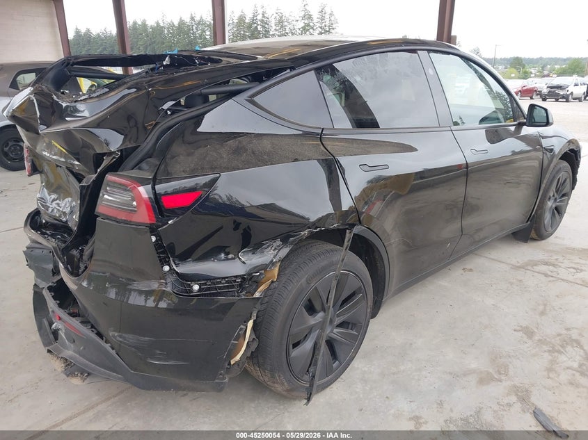 2025 Tesla Model y VIN 7SAYGDEE5SF300358 IAAI salvage auction — FRONT & REAR, Salvage Title, sold $7,900 on 2026-07-16 (photo 4)