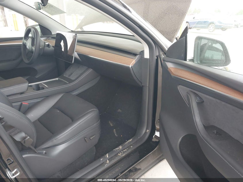 2025 Tesla Model y VIN 7SAYGDEE5SF300358 IAAI salvage auction — FRONT & REAR, Salvage Title, sold $7,900 on 2026-07-16 (photo 5)