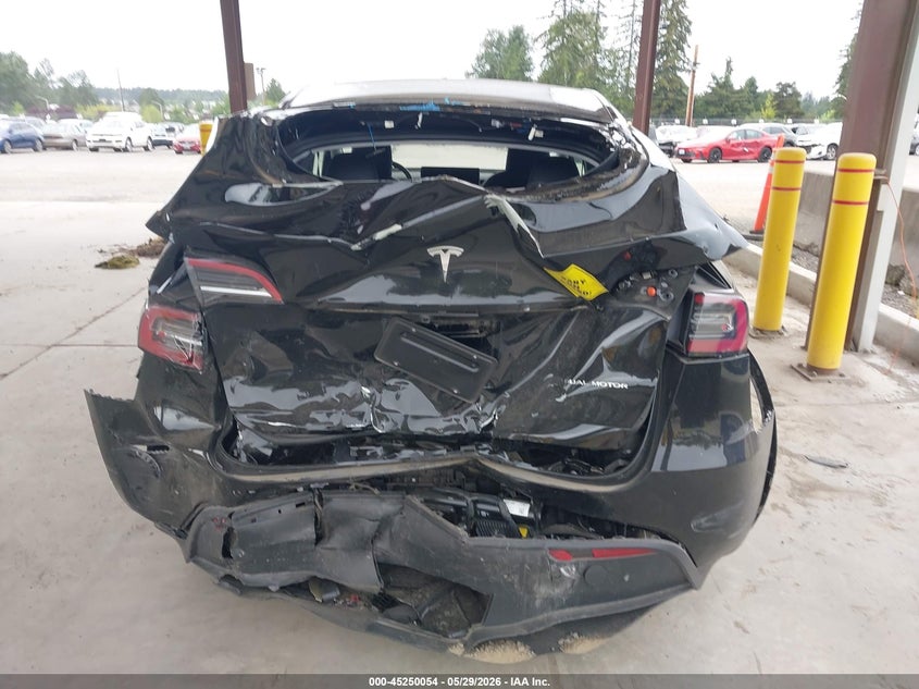 2025 Tesla Model y VIN 7SAYGDEE5SF300358 IAAI salvage auction — FRONT & REAR, Salvage Title, sold $7,900 on 2026-07-16 (photo 6)