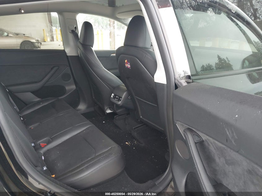 2025 Tesla Model y VIN 7SAYGDEE5SF300358 IAAI salvage auction — FRONT & REAR, Salvage Title, sold $7,900 on 2026-07-16 (photo 8)