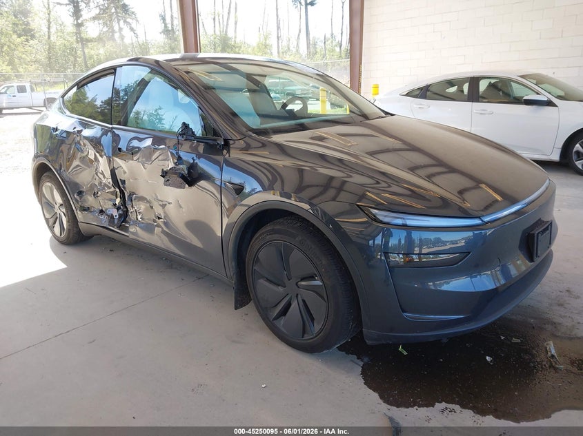 2026 Tesla Model y VIN 7SAYGDEE1TF563111 IAAI salvage auction — RIGHT SIDE, Salvage Title, sold $18,500 on 2026-07-16 (photo 1)