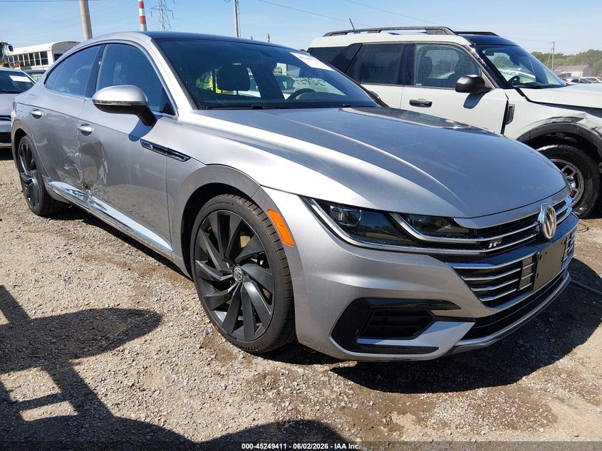 2019 Volkswagen Arteon VIN WVWSR7AN9KE019900 IAAI salvage auction — SIDE, Clear (Indiana), sold $7,100 on 2026-07-15 (photo 1)