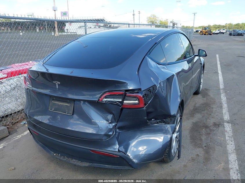 2023 Tesla Model y VIN 7SAYGDEE5PA116493 IAAI salvage auction — REAR END, Salvage Title, sold $13,550 on 2026-07-20 (photo 4)