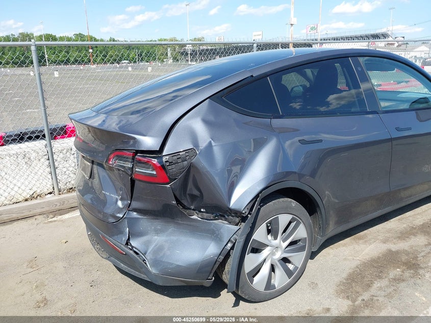 2023 Tesla Model y VIN 7SAYGDEE5PA116493 IAAI salvage auction — REAR END, Salvage Title, sold $13,550 on 2026-07-20 (photo 6)