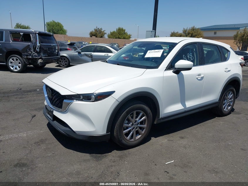 2022 Mazda Cx-5 VIN JM3KFBAM1N0547104 IAAI salvage auction — SIDE, Wait Title, sold $6,000 on 2026-07-31 (photo 2)
