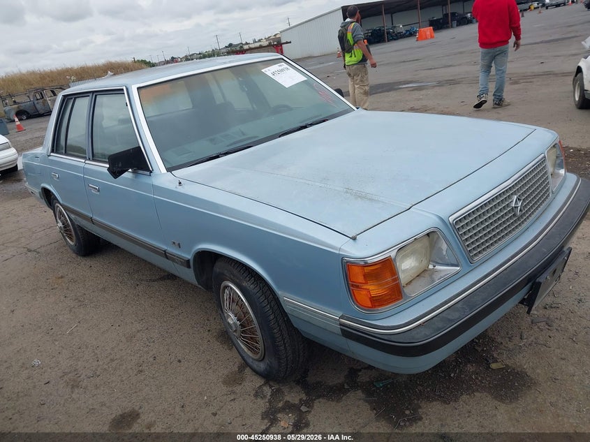 1987 Plymouth Reliant VIN 1P3BP36D2HF227831 IAAI salvage auction — NORMAL WEAR, Duplicate Paperwork (California), sold $175 on 2026-07-29 (photo 1)