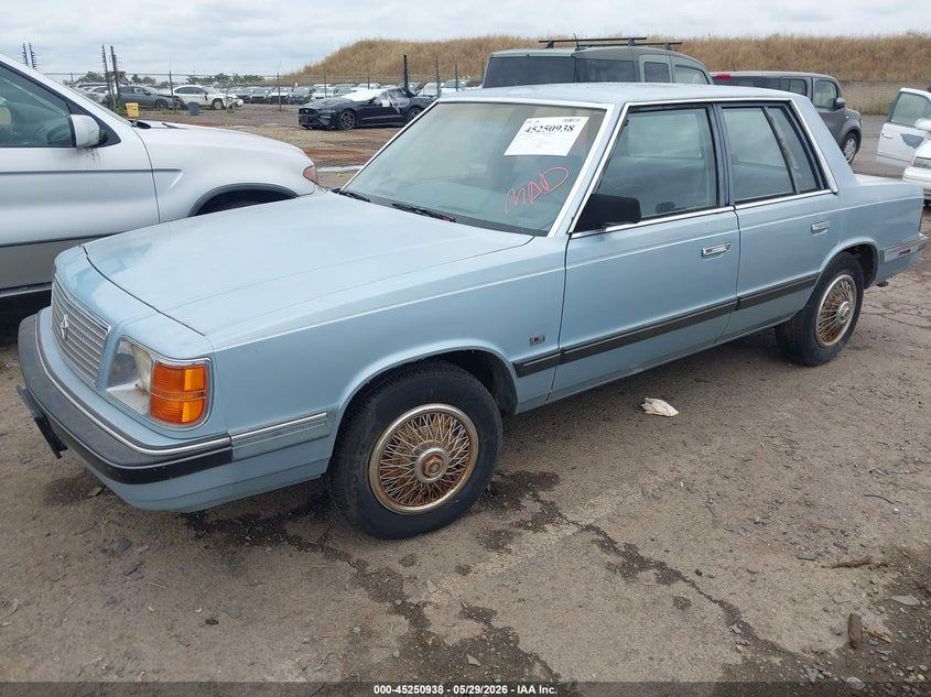 1987 Plymouth Reliant VIN 1P3BP36D2HF227831 IAAI salvage auction — NORMAL WEAR, Duplicate Paperwork (California), sold $175 on 2026-07-29 (photo 2)