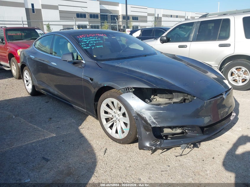 2016 Tesla Model s VIN 5YJSA1E19GF156076 IAAI salvage auction — FRONT & REAR, Original (Texas), sold $2,850 on 2026-07-16 (photo 1)