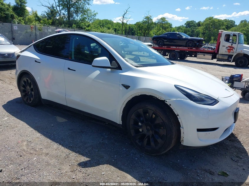 2023 Tesla Model y VIN 7SAYGDEE0PF598499 IAAI salvage auction — FRONT & REAR, Salvage Title, sold $8,100 on 2026-07-23 (photo 1)