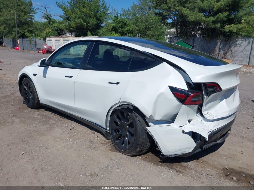 2023 Tesla Model y VIN 7SAYGDEE0PF598499 IAAI salvage auction — FRONT & REAR, Salvage Title, sold $8,100 on 2026-07-23 (photo 3)
