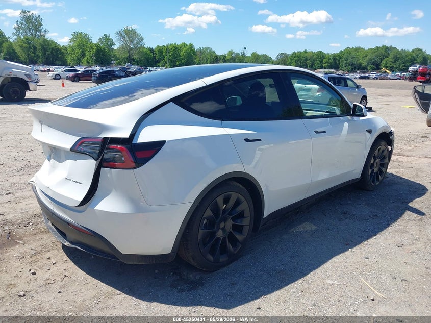 2023 Tesla Model y VIN 7SAYGDEE0PF598499 IAAI salvage auction — FRONT & REAR, Salvage Title, sold $8,100 on 2026-07-23 (photo 4)