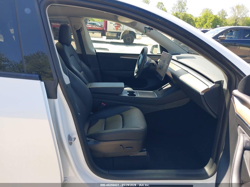 2023 Tesla Model y VIN 7SAYGDEE0PF598499 IAAI salvage auction — FRONT & REAR, Salvage Title, sold $8,100 on 2026-07-23 (photo 5)